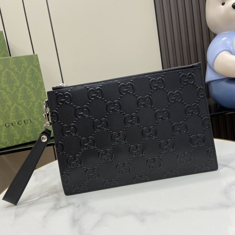 G*u*i clutch bags